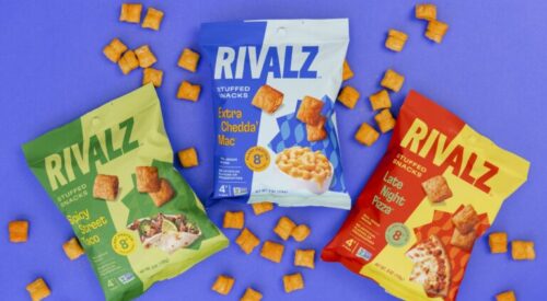 Packets of Rivalz surrounded by loose product on purple background